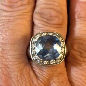 .925 sterling halo ring w light blue stone